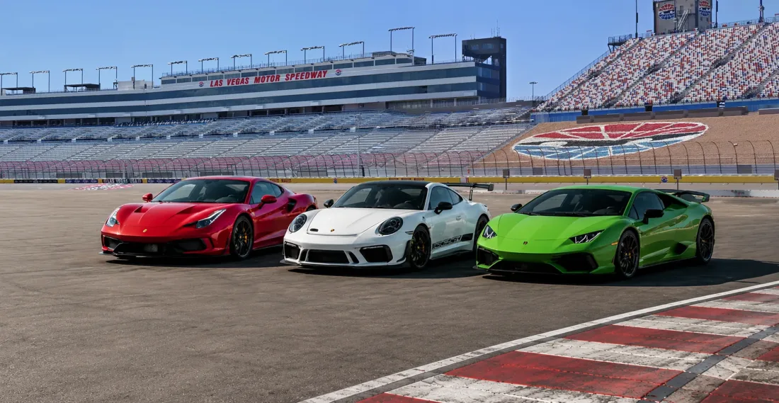 A Ferrari, Porsche and Lamborghini lined up at Las Vegas Motor Speedway